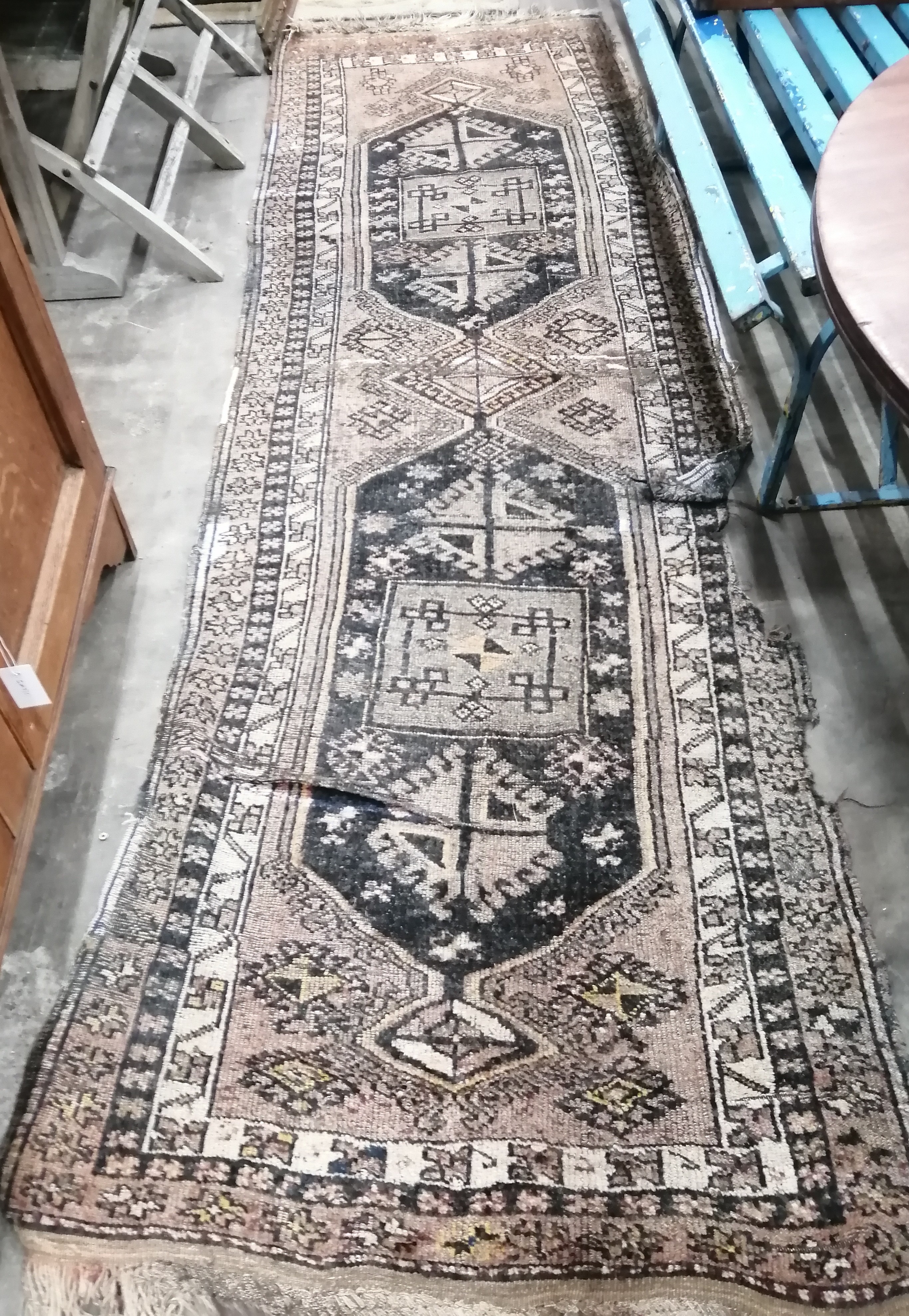 A Caucasian blue ground runner (a/f), 300 x 94cm together with a North West Persian style machined blue ground runner